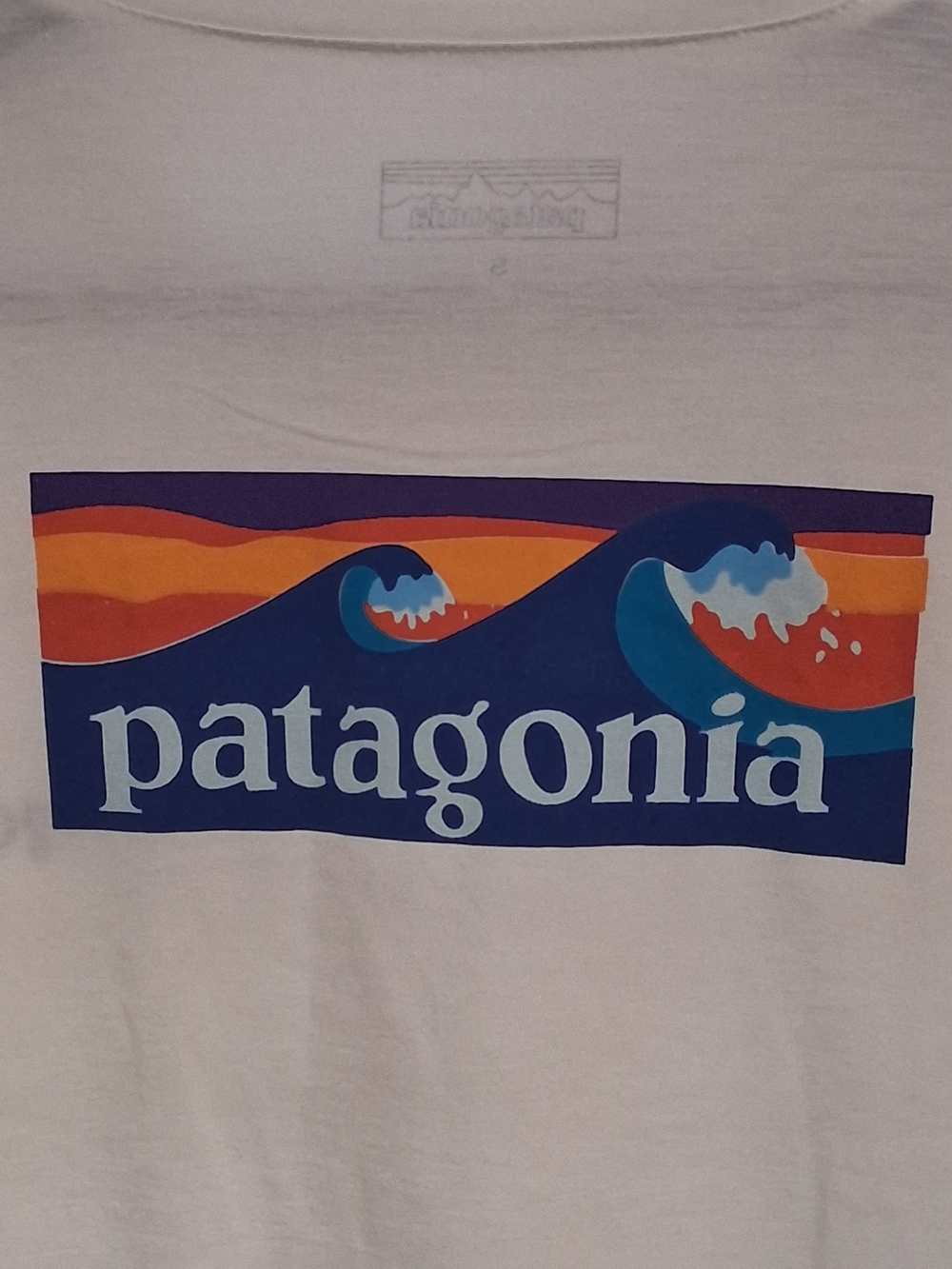 Patagonia White Tee with Blue, Orange & Purple Wave Graphic